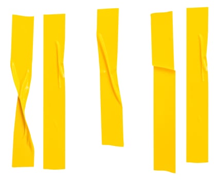 Top view set of wrinkled or crumpled yellow adhesive vinyl tape or cloth tape in stripes shape isolated on white background with clipping path photo