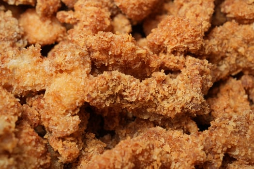 A close up of fried chicken pieces photo