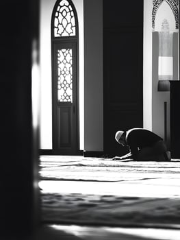 Praying muslim men. Believe in Islam in the Mosque photo