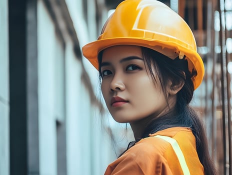 Female Construction worker. Hard Hat woman manual labor photo