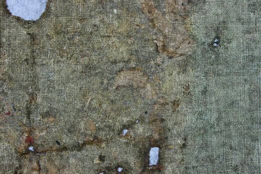 Very old fabric is spoiled by time. top view. close-up photo
