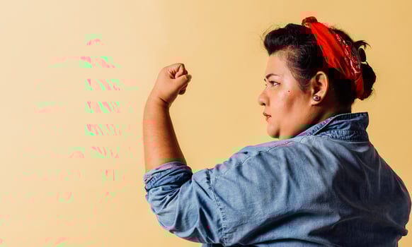 Side view portrait of woman show her strength. feminism concept. photo