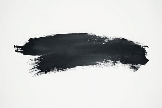 A bold black brush mark stretches across a clean white canvas, demonstrating an artistic expression that contrasts sharply with the background, evoking a sense of modern minimalism and creativity. photo