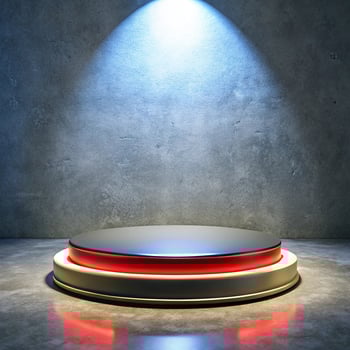 An empty round table with a spotlight shining on it photo