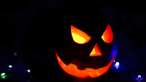 glowing jack-o'-lantern the darkness photo