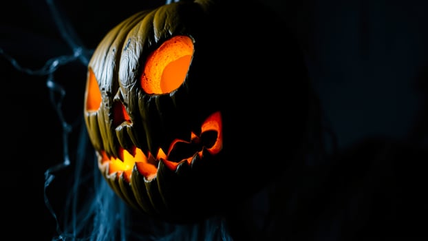 glowing carved pumpkin halloween photo
