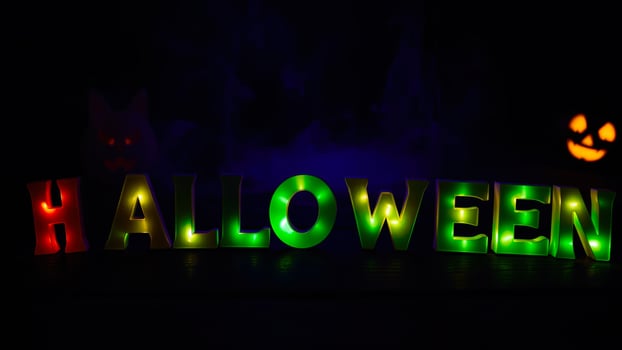 illuminated halloween letters create festive ambiance photo