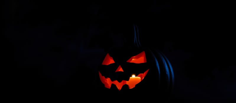 glowing carved pumpkin photo