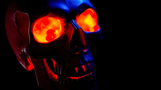 glowing skull with red eyes photo