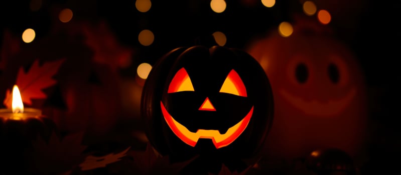 glowing jack-o'-lantern with a toothy grin photo
