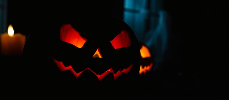 glowing jack-o-lantern with a sinister grin photo