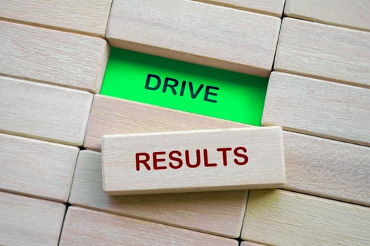 Top view of Drive Results text on wooden blocks. photo