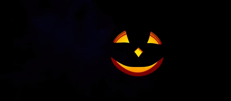 glowing carved face with a smile photo