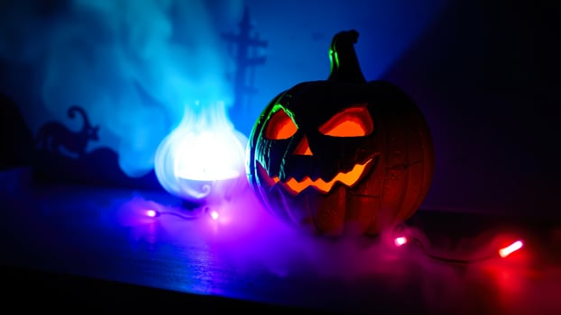 glowing jack-o'-lantern with an eerie smile photo