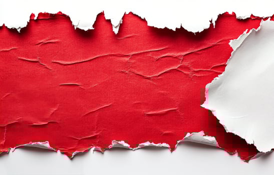 Abstract red artwork with a textured surface and torn paper effects on a white background photo