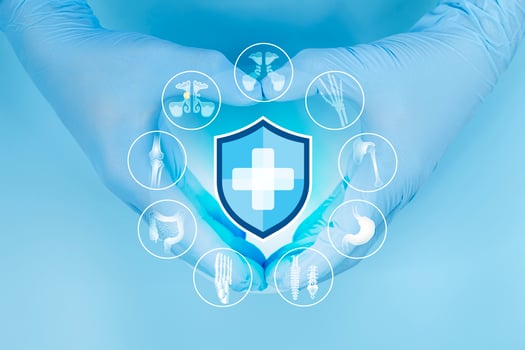 Doctor's Hand holds the health insurance icon. Health insurance concept. Access to health and wellness. photo