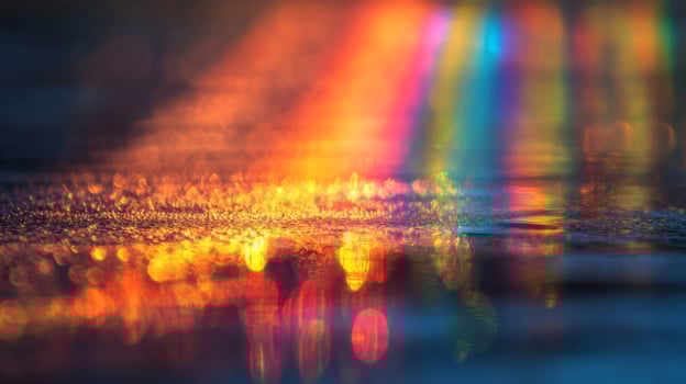 Abstract Reflections of a Rainbow in Water photo