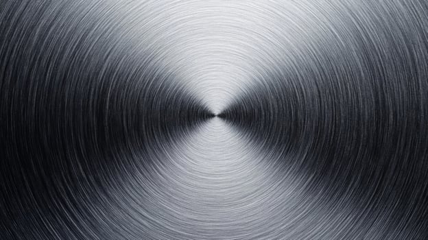 Abstract Circular Pattern on a Brushed Metal Surface photo