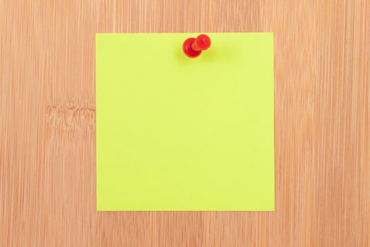Yellow Sticky Note Pinned to the Wooden Message Board. To Do List Reminder in Office. Blank Memo Sticker at Work - Template. Empty Checklist - Mockup photo