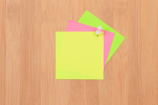 Colored Sticky Notes with Copyspace Pinned to the Wooden Message Board. To Do List Reminder in Office. Blank Memo Sticker at Work - Template. Empty Checklist - Mockup photo