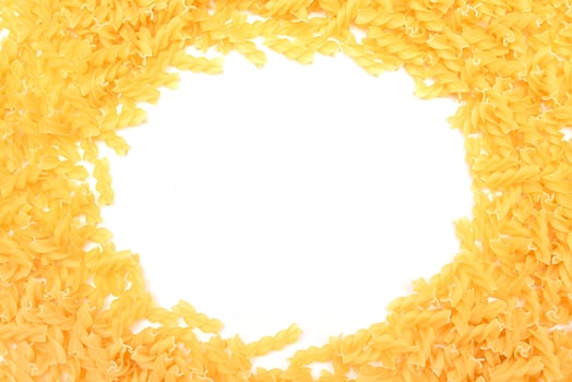 A Frame Made from Uncooked Fusilli Pasta Scattered on White Table - Mock Up. Raw and Dry Macaroni. Unhealthy and Fat Food. Italian Culture photo