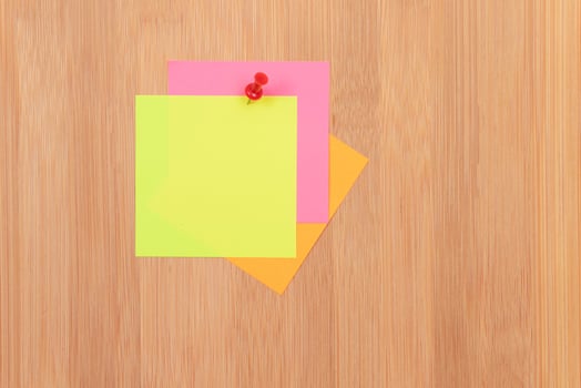 Colored Sticky Notes with Copyspace Pinned to the Wooden Message Board. To Do List Reminder in Office. Blank Memo Sticker at Work - Template. Empty Checklist - Mockup photo