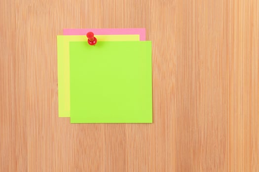 Colored Sticky Notes with Copyspace Pinned to the Wooden Message Board. To Do List Reminder in Office. Blank Memo Sticker at Work - Template. Empty Checklist - Mockup photo