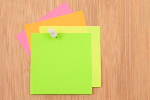 Colored Sticky Notes with Copyspace Pinned to the Wooden Message Board. To Do List Reminder in Office. Blank Memo Sticker at Work - Template. Empty Checklist - Mockup photo