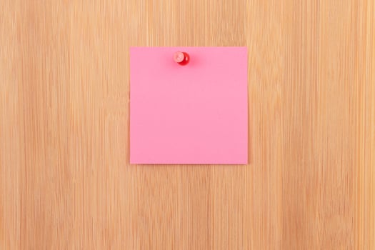 Pink Sticky Note Pinned to the Wooden Message Board. To Do List Reminder in Office. Blank Memo Sticker at Work - Template. Empty Checklist - Mockup photo