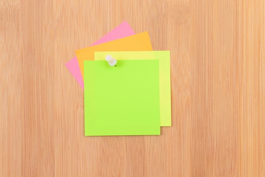 Colored Sticky Notes with Copyspace Pinned to the Wooden Message Board. To Do List Reminder in Office. Blank Memo Sticker at Work - Template. Empty Checklist - Mockup photo