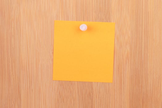 Orange Sticky Note Pinned to the Wooden Message Board. To Do List Reminder in Office. Blank Memo Sticker at Work - Template. Empty Checklist - Mockup photo