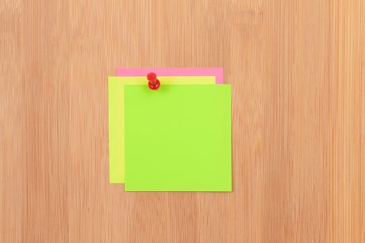 Colored Sticky Notes with Copyspace Pinned to the Wooden Message Board. To Do List Reminder in Office. Blank Memo Sticker at Work - Template. Empty Checklist - Mockup photo