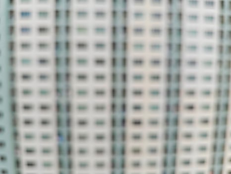 Blurred view of balcony and windows of apartment building. photo