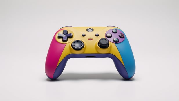 A vibrant colorful game controller stands against a pristine white backdrop photo