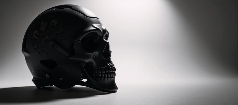 Gothicthemed football helmet adorned with a menacing skull design photo