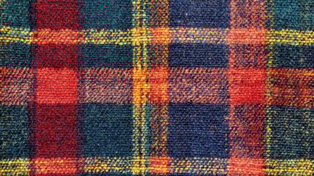 Close-up of Red, Blue, and Yellow Plaid Fabric photo