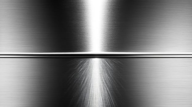 Brushed Metal Surface with a Bright Vertical Line and a Horizontal Seam photo
