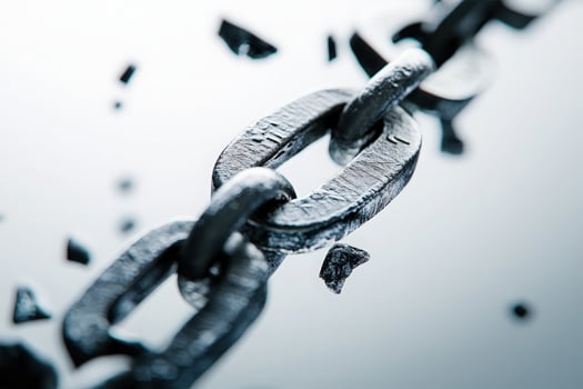 The visual representation of a broken chain highlights the fragility of financial connections, illustrating the potential harm of economic breakdowns in a minimalist design. photo
