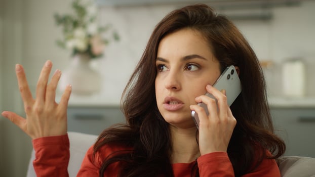 Annoyed irritated young Caucasian woman female girl client customer talking argue mobile phone call yelling mad dissatisfied businesswoman shouting speak smartphone business conflict quarrel at home photo