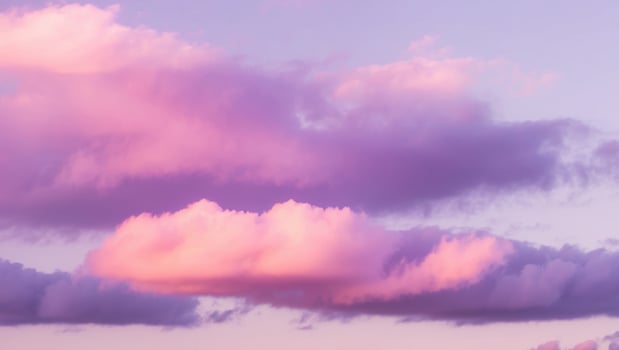 A purple sky with pink clouds photo