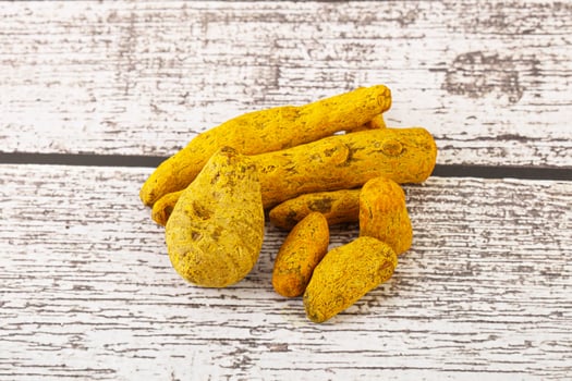 Indian spices - Turmeric root Curcuma photo