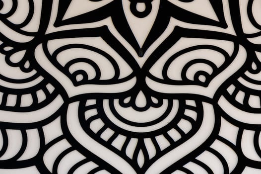 Intricate Black and White Abstract Design Featuring Swirling Patterns and Shapes, Captivating Viewers With Its Mesmerizing Detail and Symmetry photo