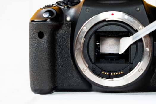 SLR Camera Sensor Cleaning with Swab photo