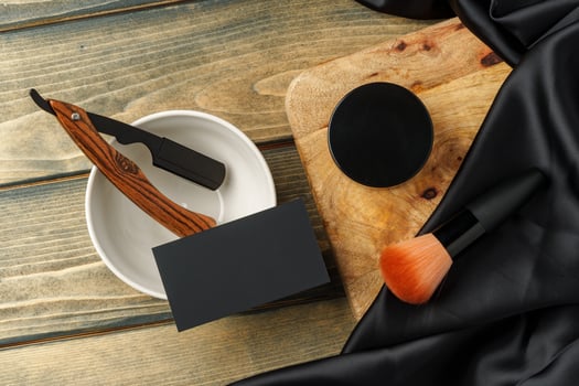 Set of professional barber tools on wooden table photo