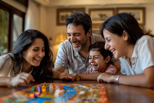 A family playing a board game together photo