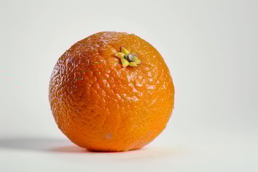 A close up of an orange on a white background photo