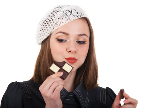 Young cute brunette girl with chocolate photo