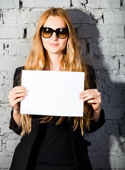 Beautiful girl with big black glasses photo
