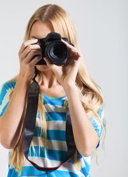 Creative woman photographer takes photos