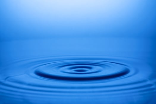 Tranquil Blue Water Ripple Creating a Calming and Serene Atmosphere in a Minimalistic Abstract Background photo